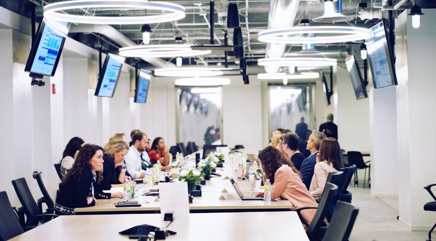 Shore Capital Partners team working in an open office